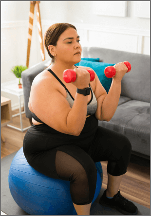 Woman exercising with weights